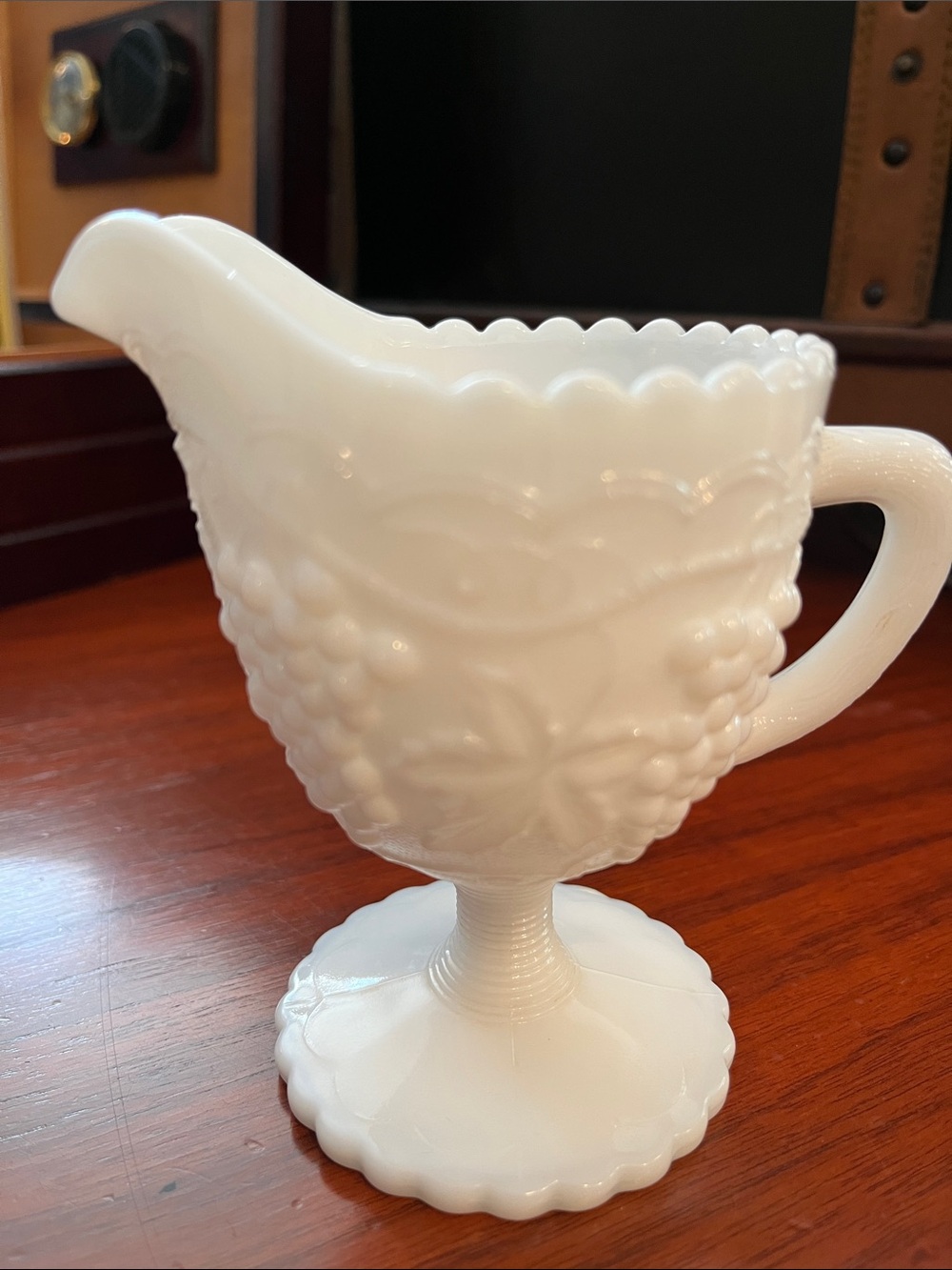 Imperial Glass creamer from the Vintage Grape pattern, made of white milk glass.